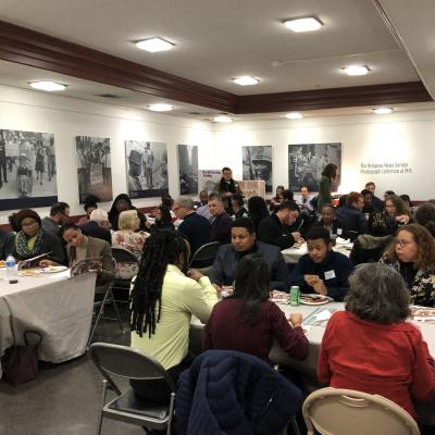 Students and their friends and families seated